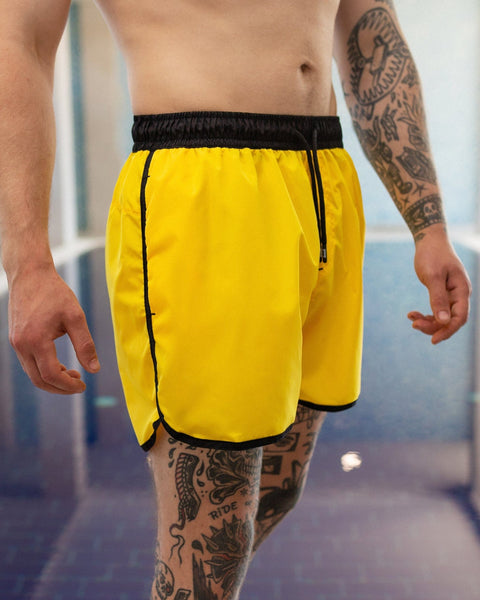 Yellow swimming shorts "AQUA"